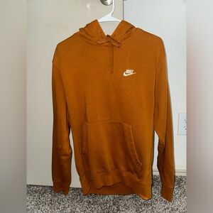 COPY - Woman’s Nike Sweatshirt in rustic yellow/orange in the size SMALL
